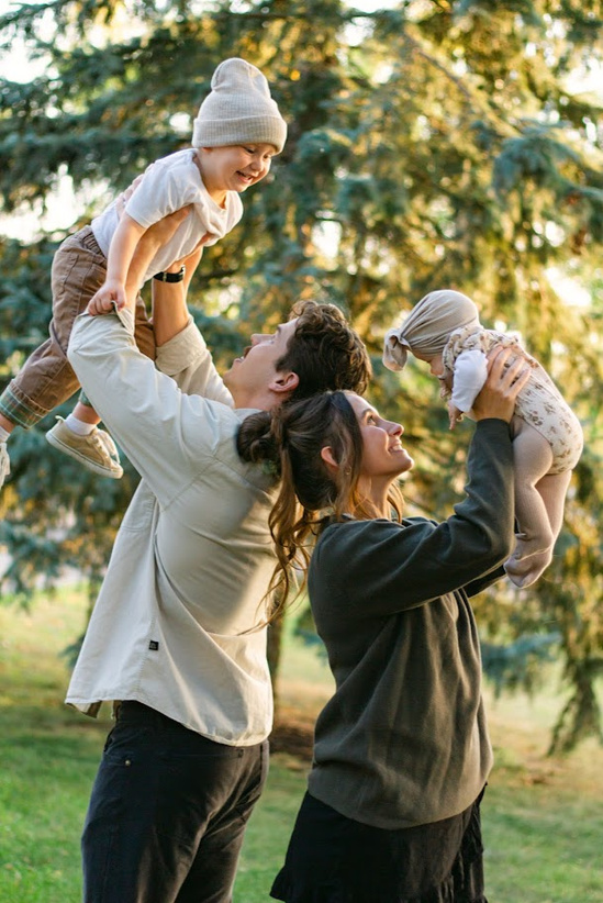 Abby and her family playing outside